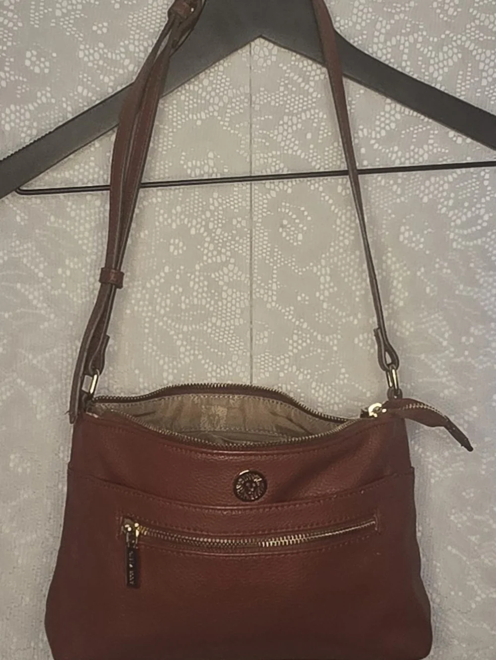 Anne Klein Cognac Brown Pebbled Faux Leather Crossbody Purse with Lion Logo